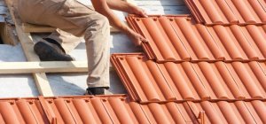 Comment aménager sa toiture pour faire face aux intempéries ?